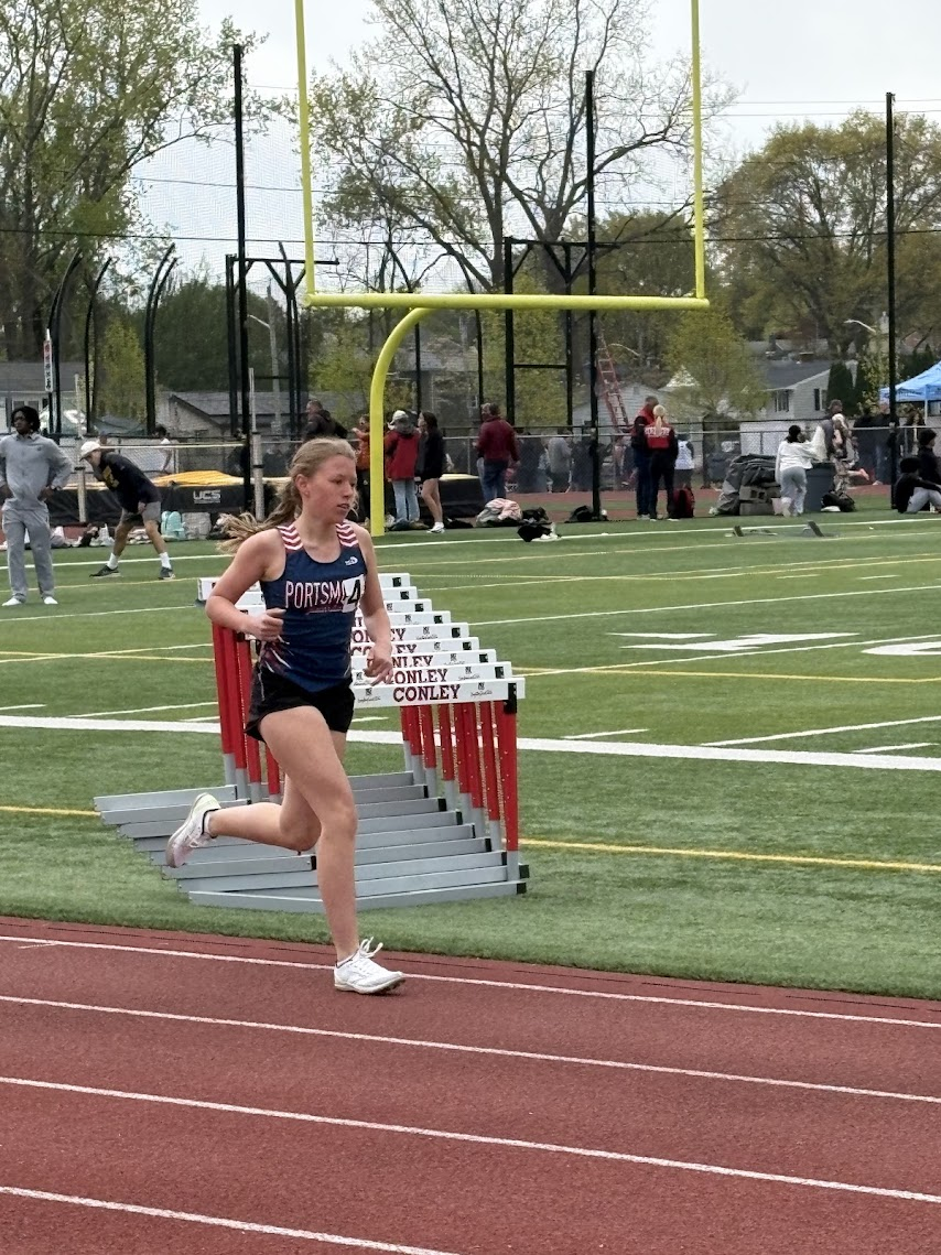 Eva running in competition